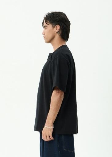 Afends Script Boxy Tee in Black - men's t-shirt side view